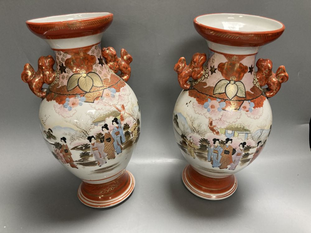 A pair of Japanese two handled bronzed vases and a pair of Japanese Kutani vases, tallest 37cm